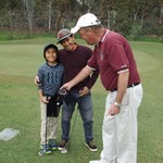 Orton KONG with his father Chantha winning the Onto-The-Third-Green prize